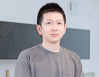 不動産部統括 岡本拓也